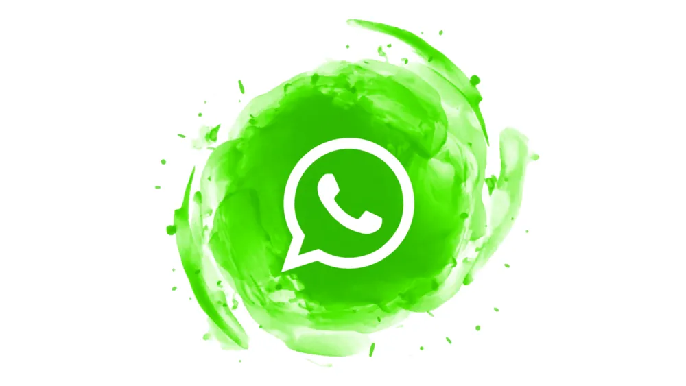 Ícone do WhatsApp sobre um respingo de tinta verde em aquarela